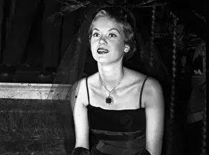 Woman Wears Hope Diamond at Party