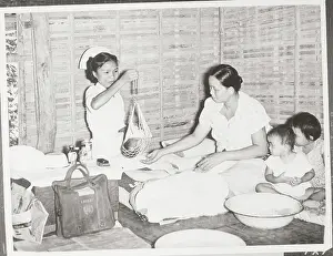 Chiang Mai Prints: woman Weighing Infant