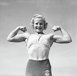 Typical Prints: Woman Weight-Lifter In Typical Pose
