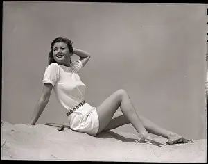 Sandals Prints: Woman in White Shirt and Shorts