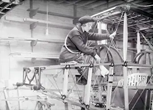Woman Working on Airplane