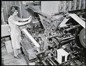 Woman Working At Cigarette Packaging