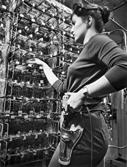 Holster Prints: Woman Working on an Early Computer