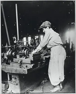 Woman Working at Metal Machine