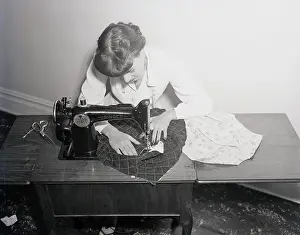 Sewing Prints: Woman Working On Sewing Machine