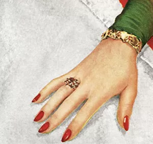 Womans hand with red fingernails