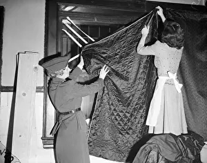 Instructor Prints: Women Blacking Out Windows With Blanket
