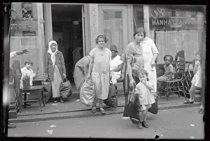 Scarcity Prints: Women Bringing Food to Poor Neighborhood