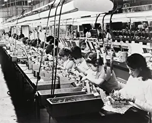 Assembling Prints: Women Building Timers on Assembly Line