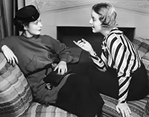 Two women in casual conversation