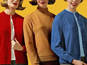 Three Women in Different Color Sweaters