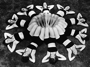 Teamwork Prints: Women exercising in circle