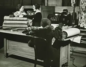 Rolled Up Prints: Three women in fabric shop, (B&W)