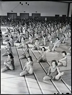 Gymnasium Prints: Women On The Floor Do Excercises