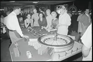 Women Gambling at Roulette Wheel
