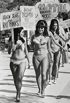 Women in Go-Go Outfits Protesting