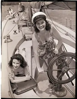 Ships Wheel Prints: Women at the Helm of Sailboat