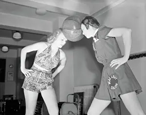 Posture Prints: Women Hold Medicine Ball Between Heads