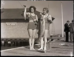 Pole Prints: Women Holding Fish on Pier