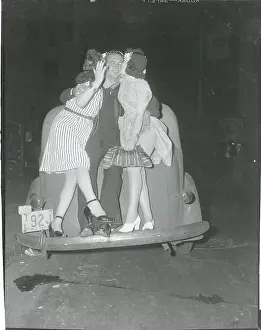 Adoration Prints: Women Kissing Soldier During Victory Celebration