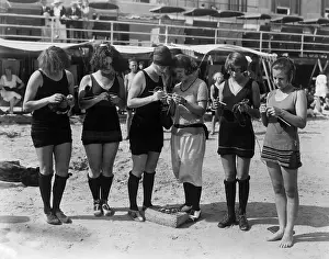 Togetherness Prints: Women knitting at beach