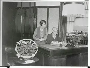 Two Women Managing Bank