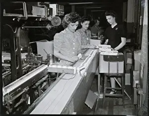Conveyor Belt Prints: Women Packaging Cigarettes In Factory