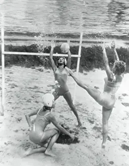 Women Playing a Game Underwater