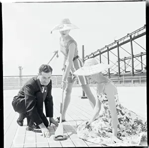 Women Playing Shuffleboard in Fashionable Straw Hats