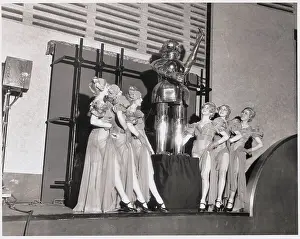 Women Posing With Alpha the Robot
