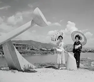 Women Posing Beside the Peace Bridge