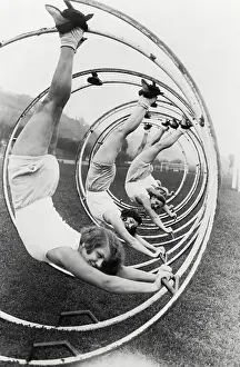 Upside Down Prints: Women Preparing for Race in Hoopla Wheels, Berlin