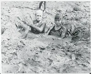 Wetland Prints: Women Relaxing in Mud