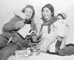 Comfortable Prints: Women Resting in Igloo