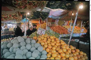 Women Shop in Outdoor Fruit Market