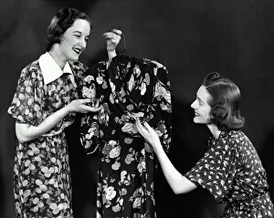 Two women shopping for dress (B&W)
