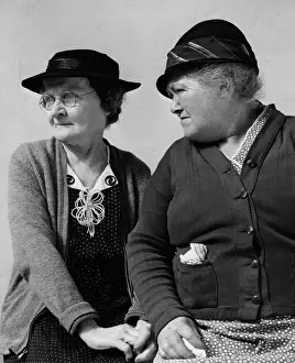 Two women sitting together, talking