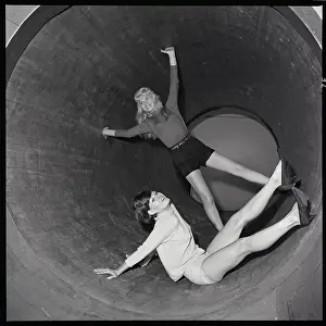 Amusement Ride Prints: Women in the Spinning Barrel