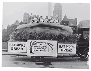 Buffalo Prints: Women Standing in a Large Loaf of Bread