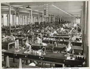 Sewing Prints: Women Stitching Ties In Factory
