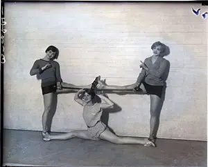 Gymnasium Prints: Three Women In Stretch-Pose In Gymnasium