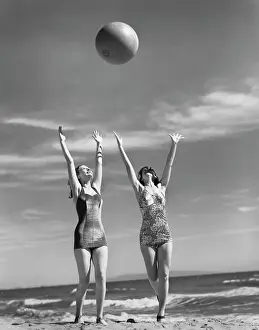Beach Ball Prints: Women Throwing Ball at Beach