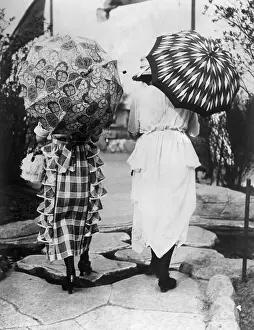 Stylish Prints: Women with umbrellas walking