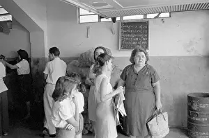 Women Wait In Line For Food
