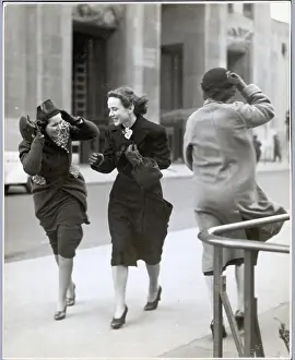 Women Walk Against the Wind