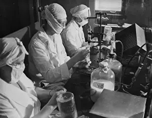 Filling Prints: Women Wear Masks In Lab; Fill Vials