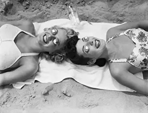 Sunbathing Prints: Women Wearing Eye Cups as Sun Protection