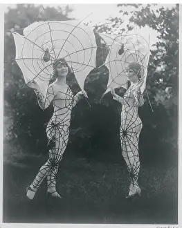 Women Wearing Spider Costumes