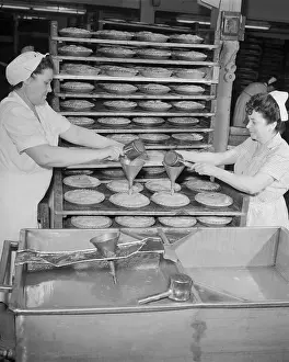 Women Working on Apple Pies in Factory