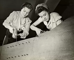 World War II (1939-1945) Collection: Women working on WW II aircraft assembly